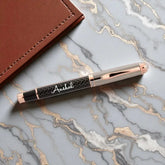 Rosegold Carbon-Fiber Personalized Pen with sleek carbon fiber body and luxurious rose gold accents, ideal for executive gifting and sophisticated writing.